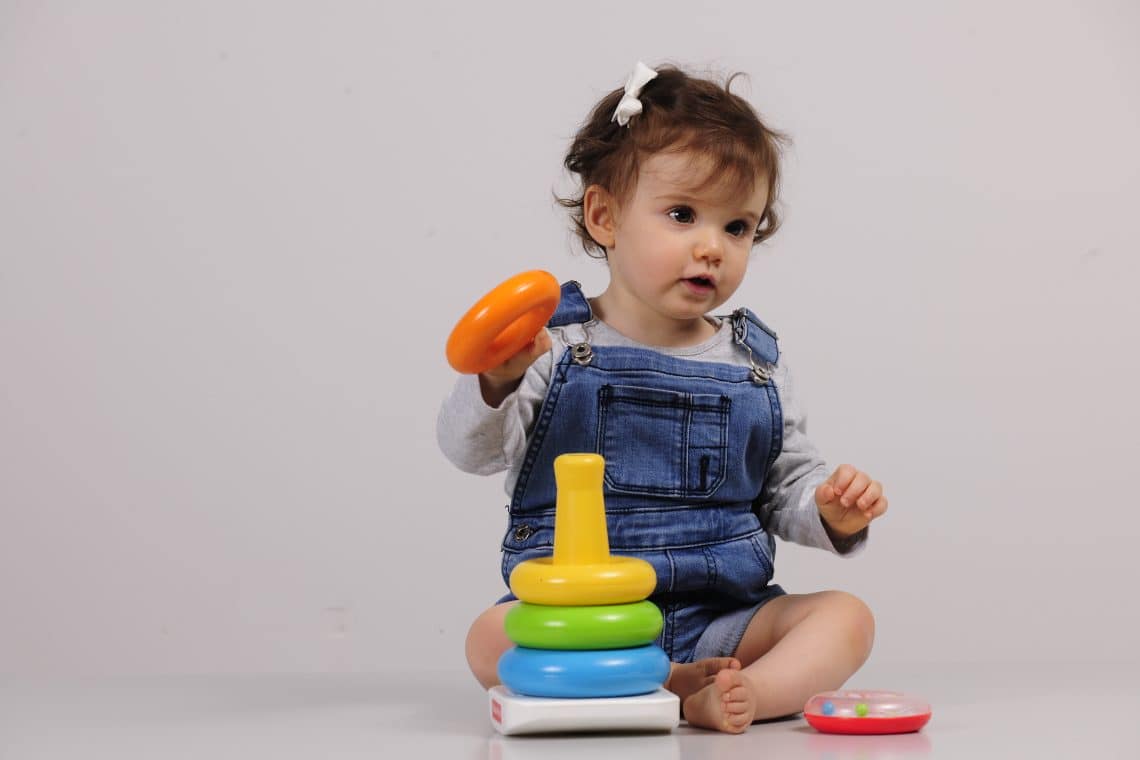 Baby playing with toys