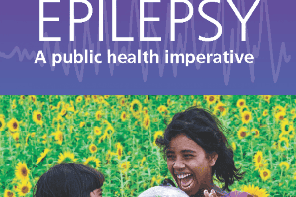 Epilepsy – A public health imperative girls holding world globe in a field